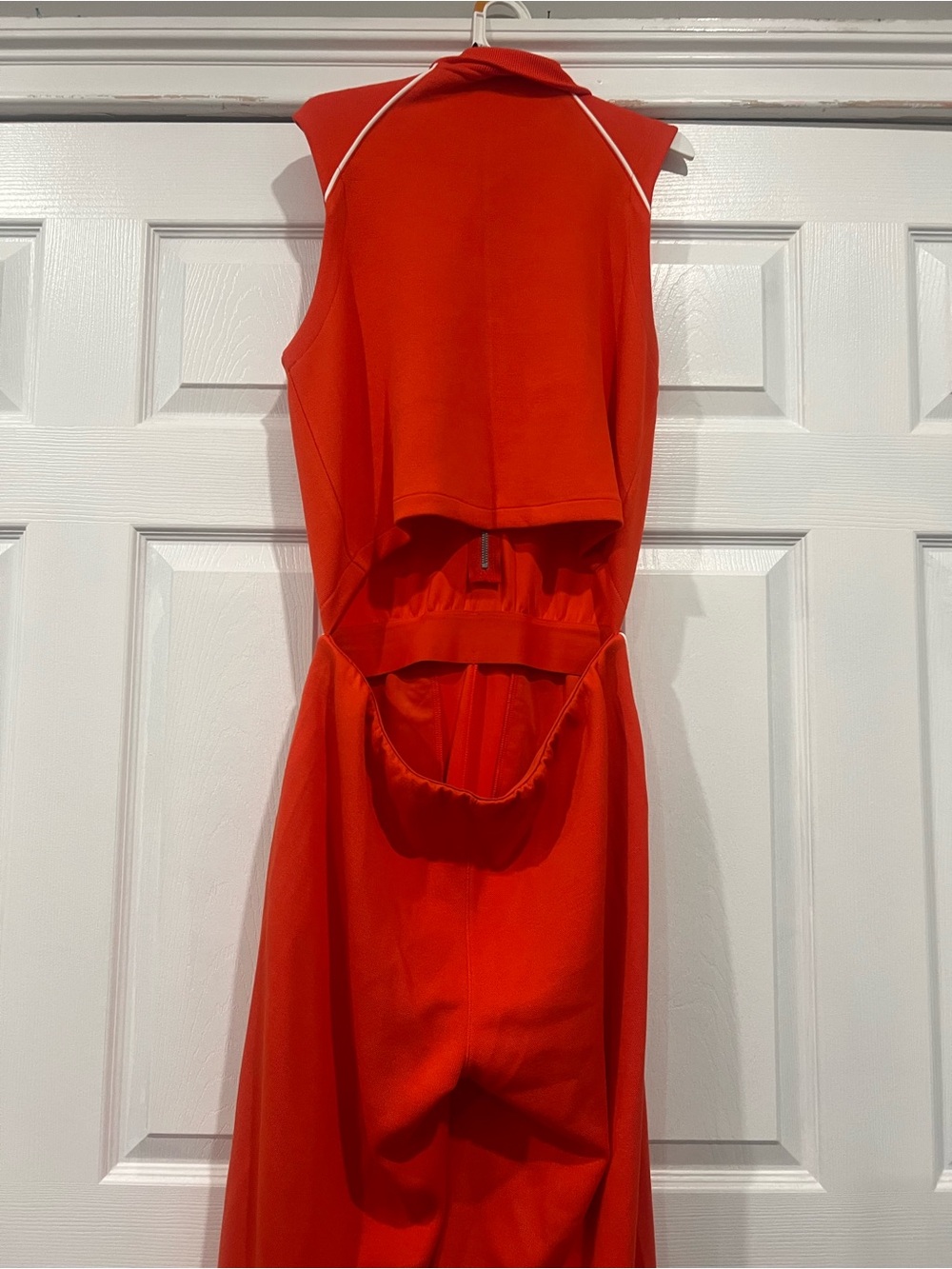Sleeveless SPANX Air Essentials jumpsuit  in Bright Orange with White Piping - Picture 4 of 6